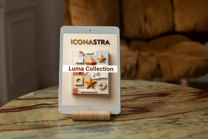 Tablet displaying the Iconastra Luma Collection on a marble surface with a blurred brown background