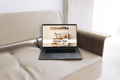 Laptop on a beige sofa displaying the Iconastra website.